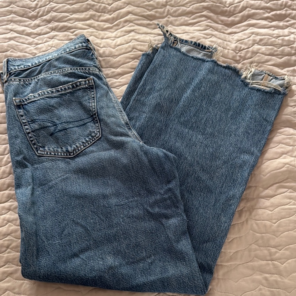 Distressed Blue Denim Jeans